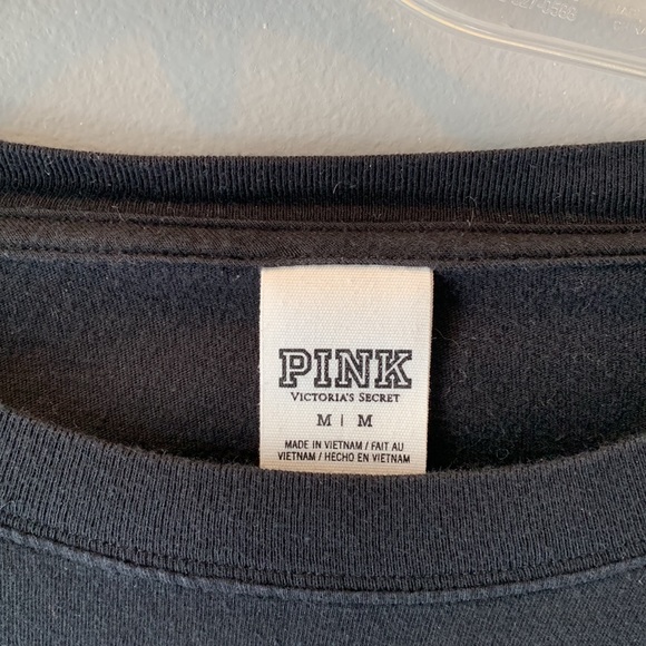 Pink varsity Black with multi color design and white stripe shirt. Size M. GUC - Picture 3 of 4